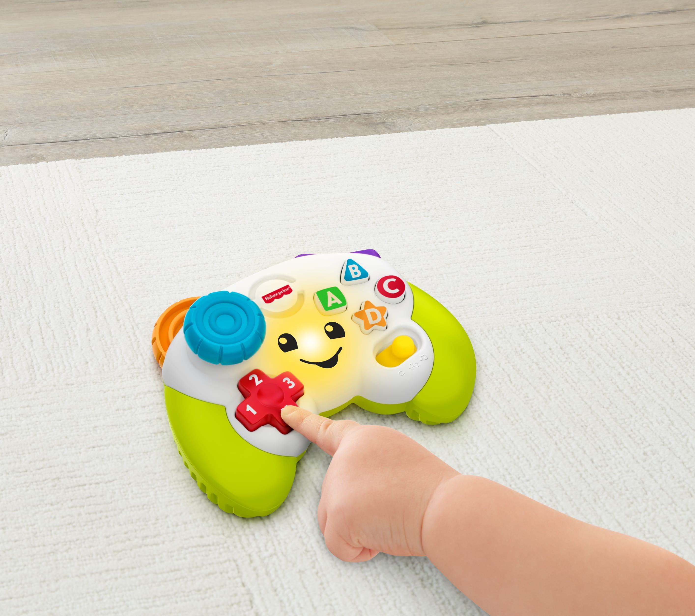 Fisher-Price Laugh & Learn Game & Learn Controller Musical Baby Toy with Lights, Multilanguage Version, Pretend video game controller learning toy for babies and toddlers with 2 musical play modes: Learning and Play