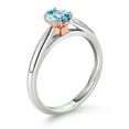 thumbnail image 3 of Gem Stone King 925 Sterling Silver and 10K Rose Gold Prongs Blue Zircon Solitaire Engagement Ring for Women (0.65 Cttw, Oval 6X4MM, Gemstone December Birthstone, Available in Size 5, 6, 7, 8, 9), 3 of 4