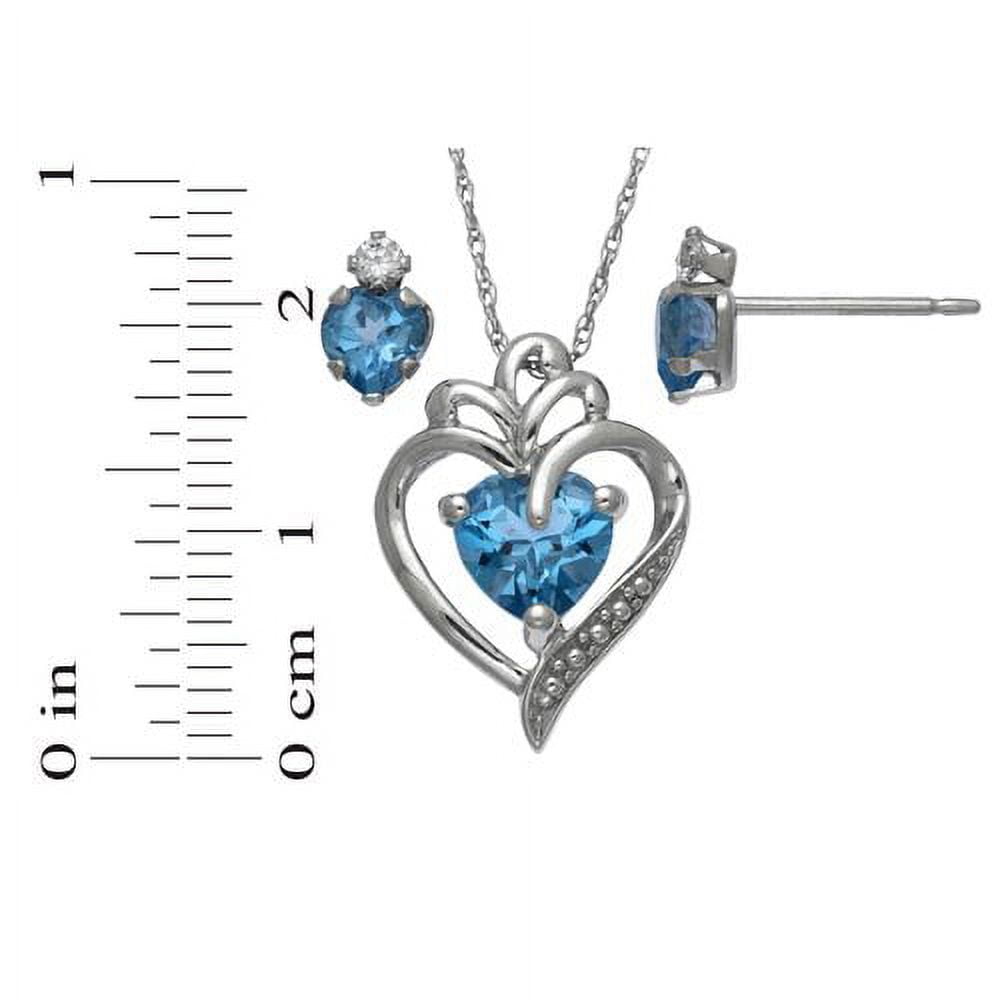 Brilliance Fine Jewelry Simulated Blue Topaz and Cubic Zirconia Set in Sterling Silver