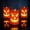 Orange, variant on Halloween Decorations Skeleton Decor, Flameless LED Skull Or Pumpkin Votive with Glitter Cutouts, 3.9x2.4in for Table Mantel Or Shelf, Safe Spooky Candle Glow