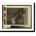 thumbnail image 2 of Historic Framed Print, [Ruth Ruyl in shorts on divan (sofa w/out back), reclining, holding doorknob of open door], 17-7/8" x 21-7/8", 2 of 9