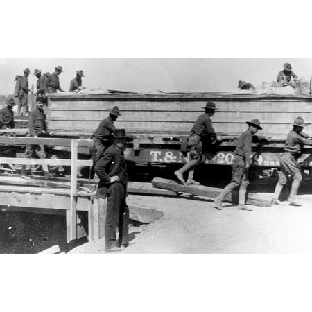 LAMINATED POSTER 1st Aero Squadron personnel unloading extra wings at Columbus, New Mexico. Poster Print 24 x