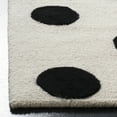 thumbnail image 3 of SAFAVIEH Kids Polka Dots Wool Area Rug, Ivory/Black, 8' x 10', 3 of 6