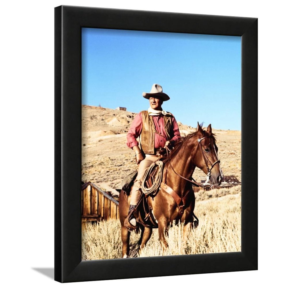 John Wayne on horse in mountains Framed Print Wall Art By Movie Star