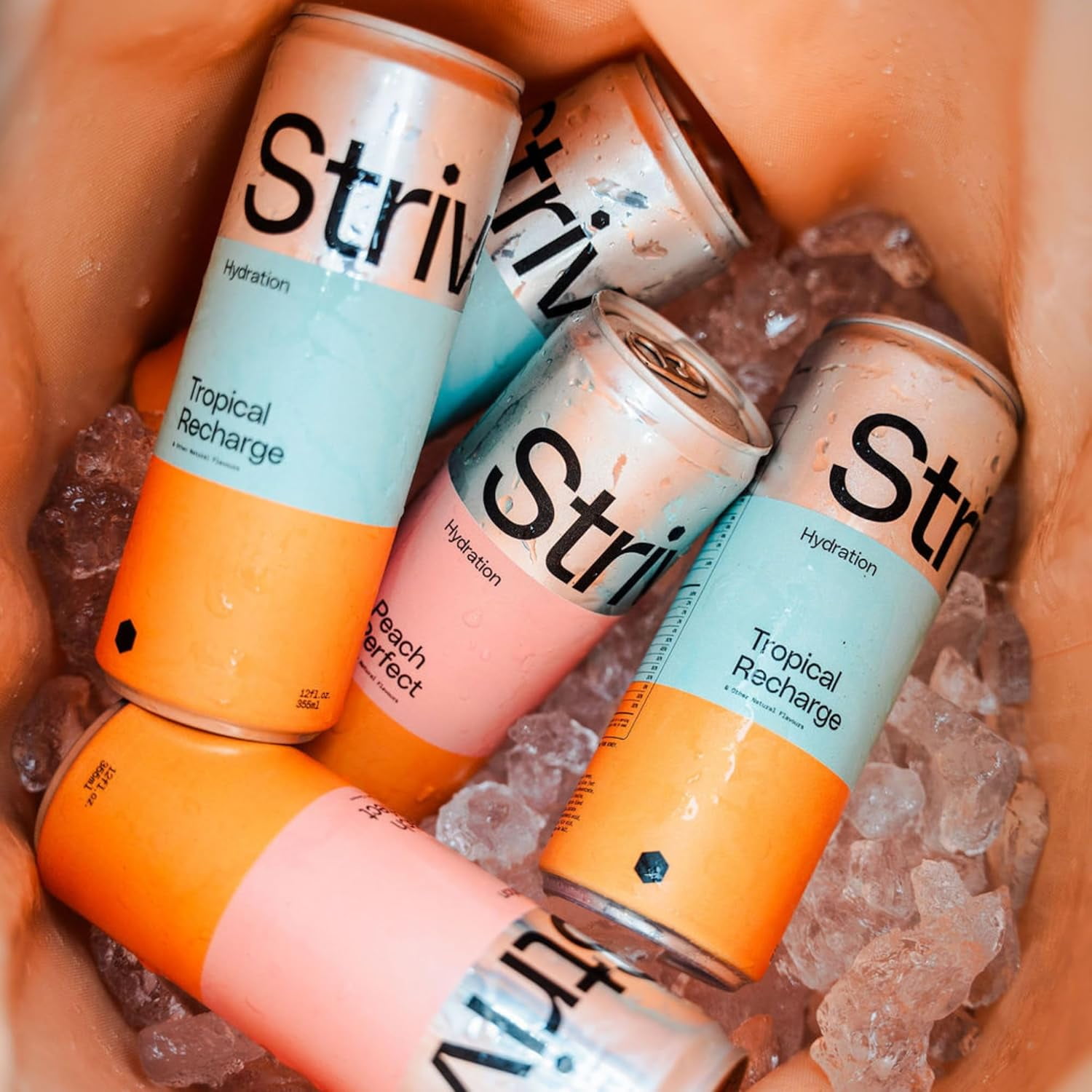 Strive Soda Tropical Recharge - Sparkling Hydration Soda with Electrolytes & Organic Honey - Passionfruit Coconut Naturally Sweetened Drink - No Artificial Sweeteners or Preservatives - 12 Pack Cans