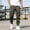 Army Green, variant on Men's Hiking Pants UPF 50  Cargo Quick Dry Water Resistant Elastic Waist Pants Muti Pockets Travel Work Lightweight Running Size 5XL Gray