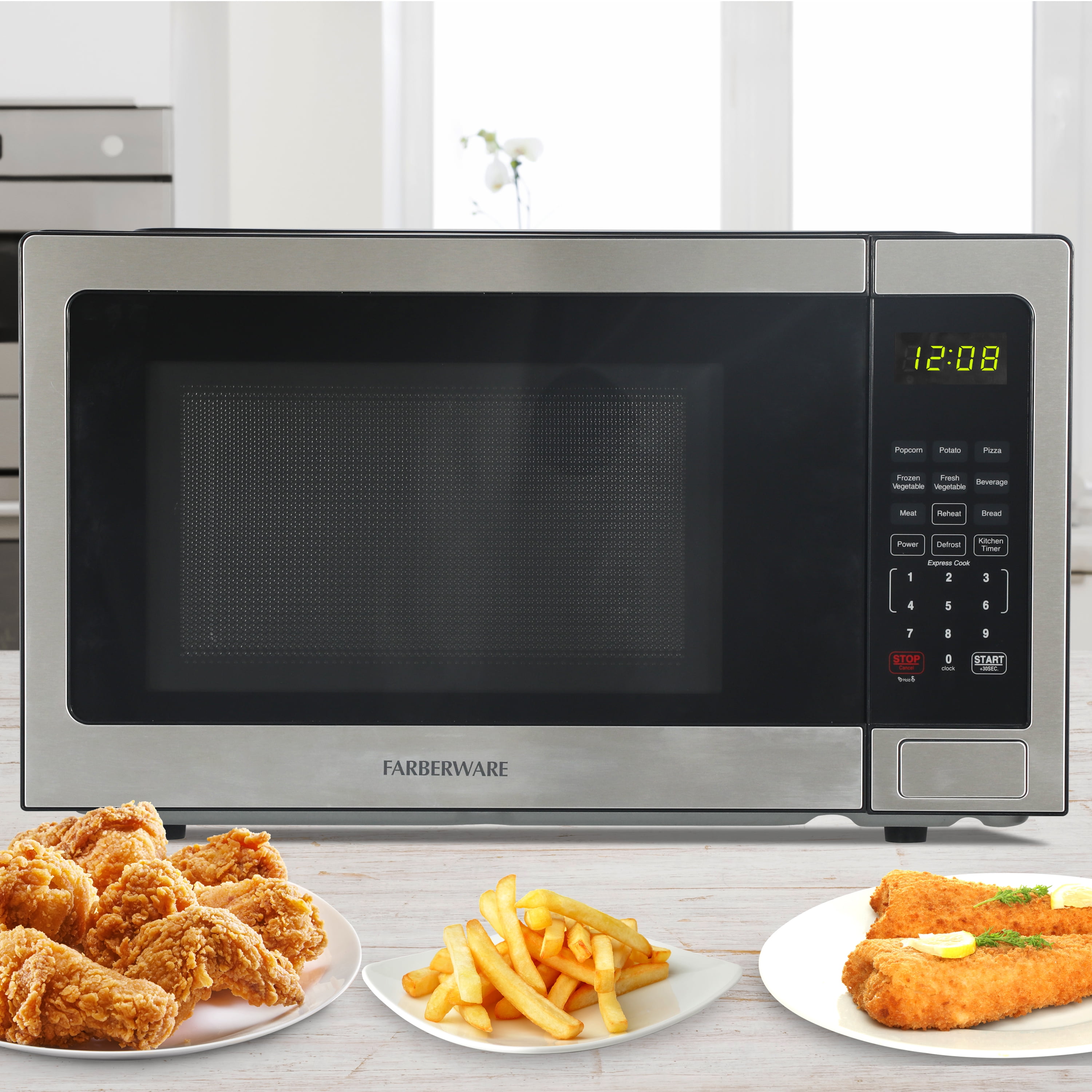 Farberware 1.1 Cu. Ft. Countertop Microwave Oven – 1000W Power, Auto Cook Settings, Defrost, and Safety Lock – Stainless Steel
