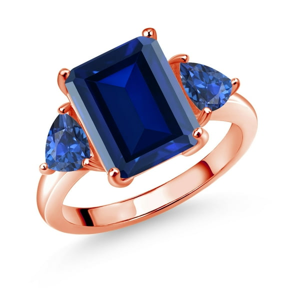 Gem Stone King 18K Rose Gold Plated Silver Blue Simulated Sapphire and Blue Created Sapphire 3 Stone Ring for Women (7.78 Cttw, Octagon 12X10MM, Trillion 5X5MM, September Birthstone, Size 5)