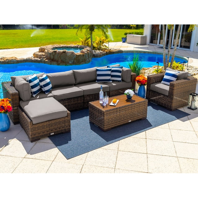 Tuscany 7-Piece Outdoor Patio Furniture Sectional Sofa Set with Four Modular Sectional Pieces, Armchair, Ottoman, and Coffee Table (Half-Round Brown Wicker, Sunbrella Canvas Taupe)