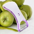 thumbnail image 1 of IDEANATEGRATE Pelador De Verduras Y De Acero Inoxidable Con Doble Hoja Color Morado, 1 of 8