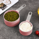thumbnail image 4 of Tazas medidoras apilables con mango de acero inoxidable para medir ingredientes secos y líquidos, 4 of 5