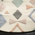 thumbnail image 3 of SAFAVIEH Kids Bowties Wool Area Rug, Ivory/Multi, 5' x 5' Round, 3 of 8