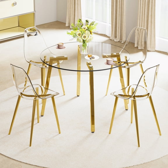 Dining Table and chairs set. Modern circular transparent tempered glass table, tempered glass tabletop, golden metal table legs.A Set of 4 Transparent Plastic Chairs with gold legs.36225