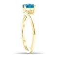 thumbnail image 2 of SZUL Women's Solitaire Oval Shaped Blue Topaz Wave Ring in 10K Yellow Gold, 2 of 5