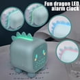 thumbnail image 3 of Reloj despertador con diseño de dinosaurio para niños, con carga USB, hora, fecha y temperatura automáticas, lámpara de noche y función de repetición, 3 of 5