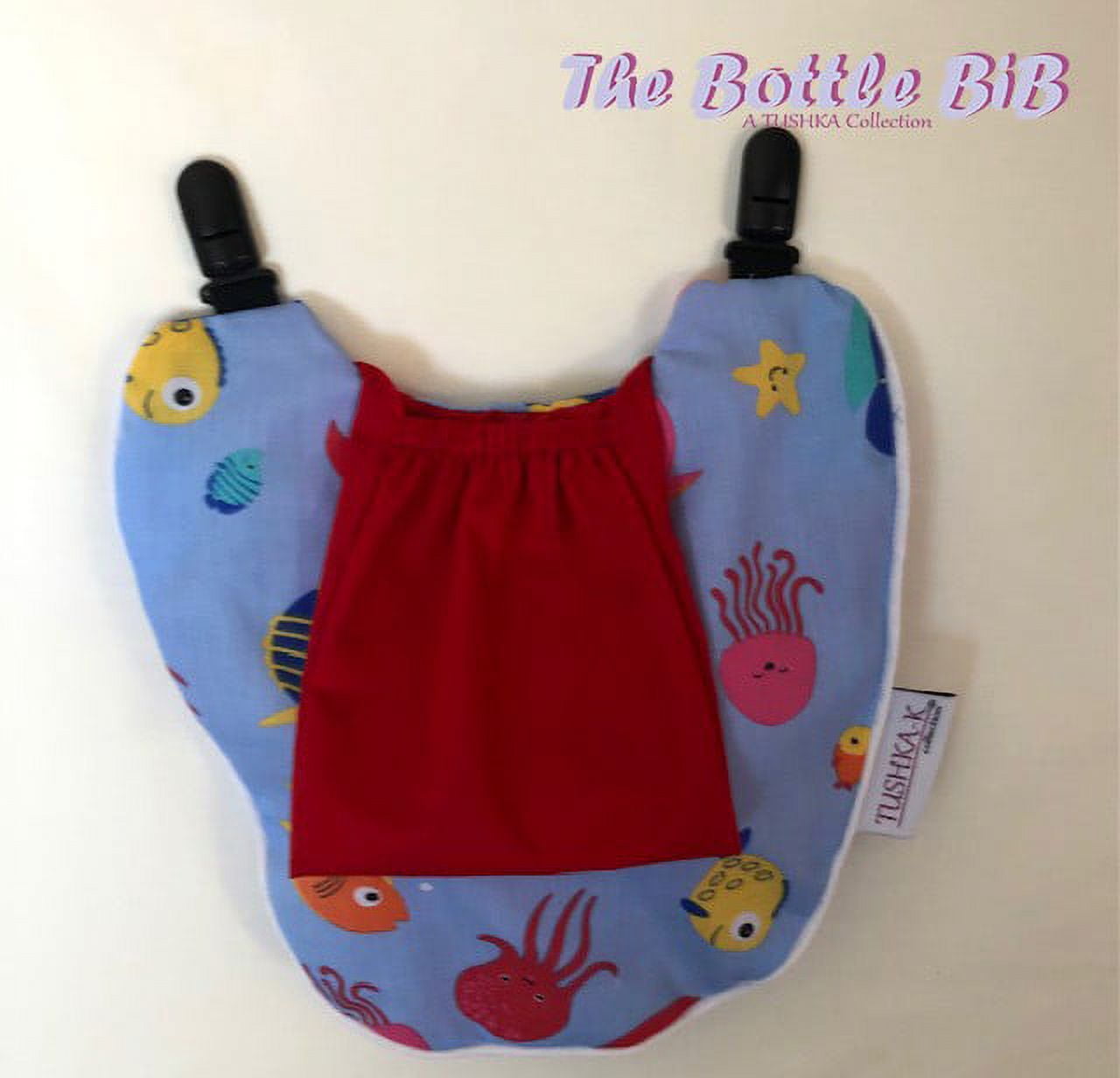 The Bottle Bib-  Ocean Blue with Red Pocket. Unisex Print. Keep Baby Bottles, Food Pouches and Training Cups, from Falling onto Dirty Surfaces!  Hands Free Feeding!