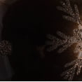 thumbnail image 5 of Vickerman 10 by 2.4" Chocolate Candy Glitter Snowflake Finial 4/Bag. Add some sparkle and shine to your holiday decorating projects with this 10 inch finial ornament. Made with shatterproof plastic. O, 5 of 6