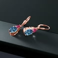 thumbnail image 4 of Gem Stone King 18K Rose Gold Plated Silver Millennium Blue Mystic Topaz and Red Created Ruby Dangle Earrings for Women (6.86 Cttw, Gemstone Birthstone, Oval 10X8MM, Trillion 5MM), 4 of 4