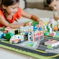 thumbnail image 6 of Melissa & Doug Deluxe Activity Road Rug Play Set with 49 Wooden Vehicles and Play Pieces, 6 of 10