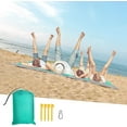 thumbnail image 4 of Beach Blanket, SandProof Beach Mat Large 4-7 Persons, Waterproof Picnic Mat Quick Drying Camping Blanket Made by Polyester with 4 Stakes for Outdoor Travel with Storage Bag (83" X 78"), 4 of 9