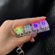 thumbnail image 3 of Llavero con teclado mecánico, colgante, juguete antiestrés con sonido táctil, botones de luz LED transparentes, llavero portátil, 3 of 7