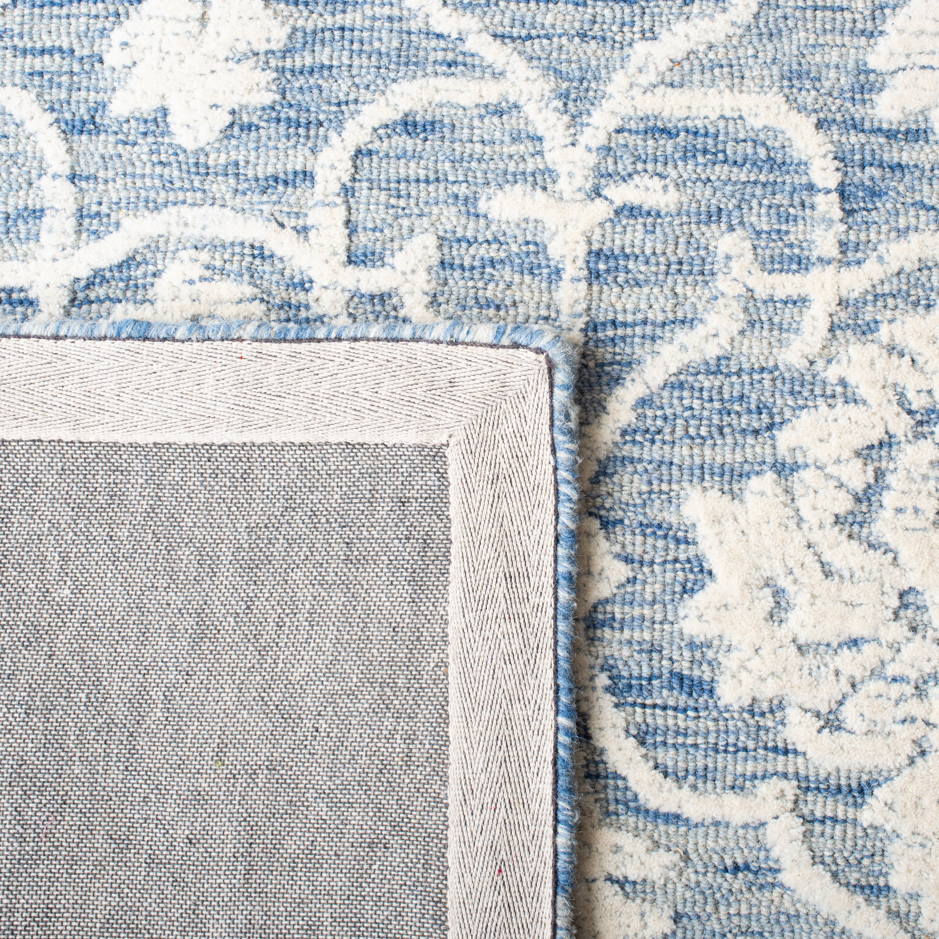 SAFAVIEH Metro Sutton Medallion Area Rug, Blue/Ivory, 6' x 6' Round