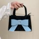 thumbnail image 4 of Bolso de mujer de nicho rosa con bonito lazo, pequeño bolso de hombro de piel sintética, elegante y moderno, bolso cruzado de alta gama literario para mujer, 4 of 5