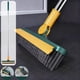 thumbnail image 1 of Cepillo para suelos de baldosas con cabezal en V y mango giratorio de 180° | Cepillo de cerdas rígidas desmontable y escobilla de goma de silicona para limpiar juntas, esquinas y baños | Juego de 1, 1 of 6