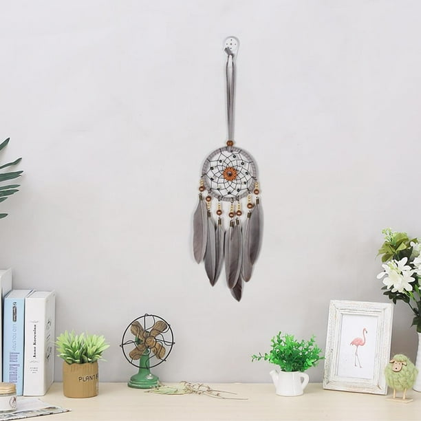 Colgantes de plumas y cuentas artesanales