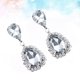 thumbnail image 2 of 1 par de pendientes plateados con forma de gota de agua, pendientes largos y brillantes con diamantes de imitación, joyería colgante, accesorios de decoración de moda para damas y niñas., 2 of 5