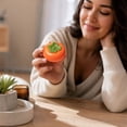 thumbnail image 6 of Persimmon Vaseline Squishy Toy, Orange Persimmon Stress Ball with Green Calyx, Jelly Filled Squeeze Fidget Toy, Stress Relief Sensory Toy for Kids Adults, Fruit Desk Decor Gift, 6 of 6
