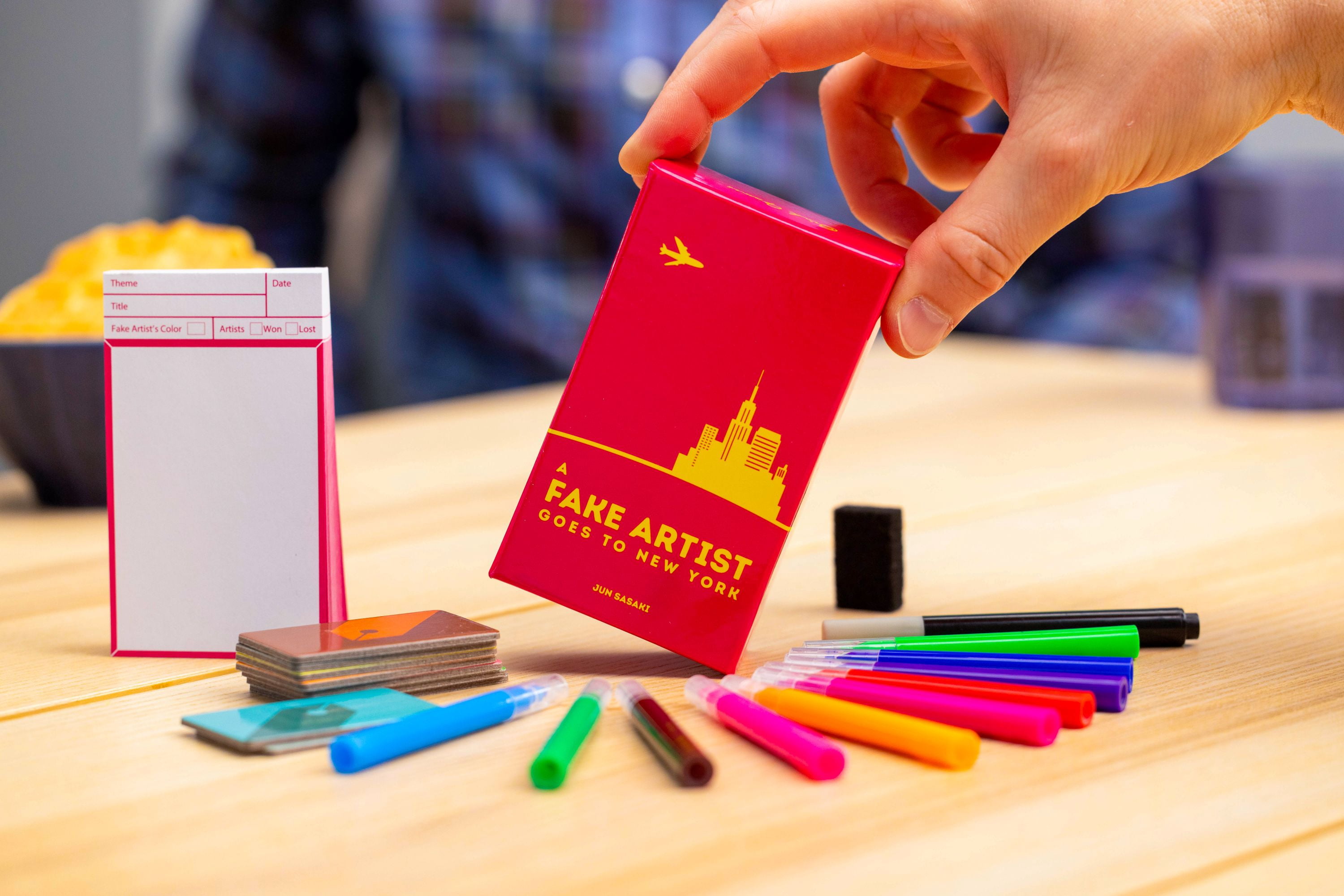 Oink Games A Fake Artist Goes to New York - Japanese Social Deduction Party Game for Families & Adults, Creative Bluffing, Hidden Roles, 5-10 Players, Ages 8+