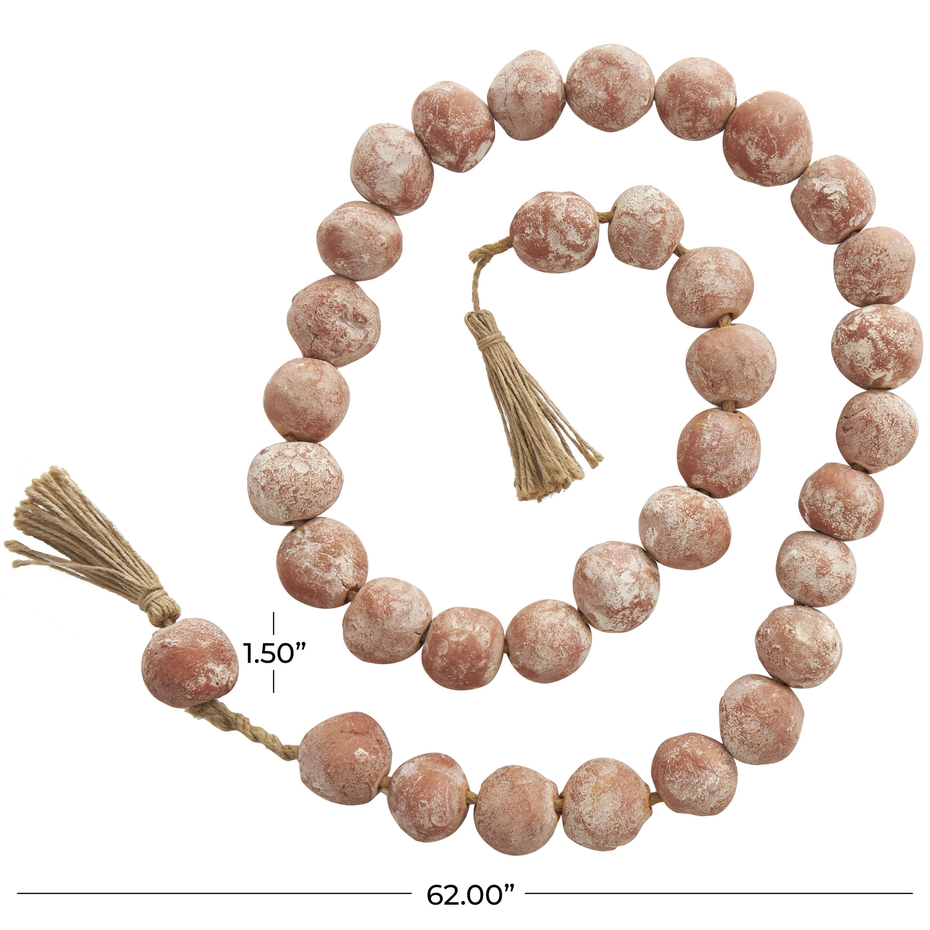 DecMode Handmade Round Intricately Shaped Large Distressed Orange Ceramic Garland with Tassel