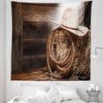 thumbnail image 1 of Western Tapestry, American West Rodeo Hat Traditional Ranching Robe on Wooden Ground Folk Art Photo, Fabric Wall Hanging Decor for Bedroom Living Room Dorm, 5 Sizes, Brown Beige, by Ambesonne, 1 of 1