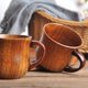 thumbnail image 5 of Paquete de 4 tazas de madera con asa, taza de madera maciza natural para beber té, cerveza, leche, café, bebidas calientes, pequeña taza para la oreja en el reverso, 5 of 5