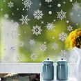 thumbnail image 2 of Agregue encanto invernal a su hogar y oficina con esta decoración de copos de nieve plateados despegables y pegables fácilmente extraíble, 2 of 5