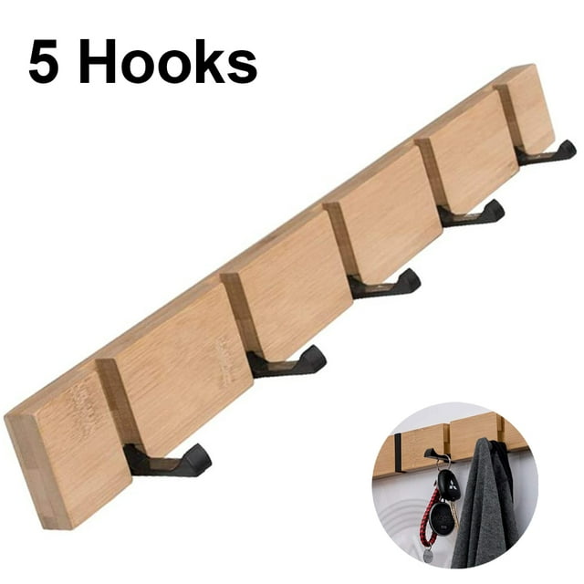 Wall coat hook with five foldable metal hooks mounted on a natural wood rack. The hooks can be folded back into the rack for a clean look and space-saving design. Ideal for use as a closet organizer or in hallways, bedrooms, and bathrooms to hang coats, hats, scarves, and other items. Includes easy assembly instructions and hardware.