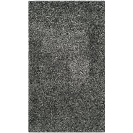 Safavieh SAFAVIEH California Shag SG151-8484 Dark Grey Rug SAFAVIEH California Shag SG151-8484 Dark Grey Rug SAFAVIEH s California Shag Collection imparts breezy coastal vibes throughout room decor. These plush pile shags are made using high-quality synthetic yarns  machine-woven into luxurious shag textures and colored in vivid hues with stylishly speckled tonal colors. These superior non-shedding shag rugs add flowing dimension to any decor  and are also well-suited for higher-traffic areas of the home with frequent kid or pet activity. Perfect for the living room  dining room  bedroom  study  home office  nursery  kid s room  or dorm room. Rug has an approximate thickness of 2 inches. For over 100 years  SAFAVIEH has set the standard for finely crafted rugs and home furnishings. From coveted fresh and trendy designs to timeless heirloom-quality pieces  expressing your unique personal style has never been easier. Begin your rug  furniture  lighting  outdoor  and home decor search and discover over 100 000 SAFAVIEH products today.