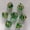 Transparent green ring with silver lettering, variant on CNV 7-Piece Ancient Relic Ring Dice Set with Preserved Flowers, Sharp Edge Polyhedral Resin Dice for TRPG Tabletop Games, Mythical Fantasy Collectible Dice Kit