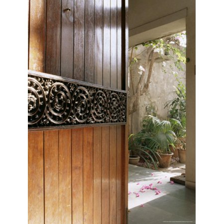 Decorating Ideas For Front Door A Modern Front Door Decorated with a 400 Year Old Piece of Wood Carving Print Wall Art By John Henry Claude Wilson ()