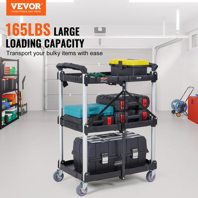 carro de servicio plegable vevor, carro de plástico resistente de 3 estantes de 165 libras con ruedas bloqueables, mango ergonómico, carro de herramientas de garaje portátil para almacen/oficina/hogar vista frontal de 3 niveles con bandejas de polipropileno negro y tubos verticales plateados, manija abatible ergonómica, tres estantes con cajas y herramientas visibles, ruedas giratorias de 4" (10.2 cm) con frenos en dos ruedas, fondo de garaje que muestra uso para almacenamiento y traslado; también adecuado para trasladar cestas de ropa o suministros ligeros.