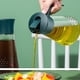 thumbnail image 4 of Olive Oil Dispenser Bottle Leakproof Glass Oil Container With Non-Slip Handle Automatic And Stopper Oil Dispenser Bottle For Kitchen 630ML, 4 of 7