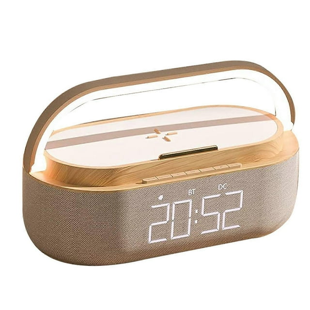 Digital alarm clock radio with Bluetooth speaker and 15W wireless charger. Features a wooden design with a fabric-wrapped speaker, a dimmable LED display, and touch controls. Includes upgraded Bluetooth 5.0 for enhanced HD sound and a 2500mAh rechargeable battery for up to 16 hours of playtime. Suitable for bedrooms, living rooms, or kitchen counters.