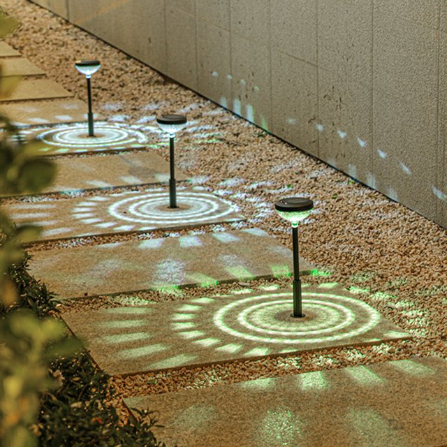La lámpara LED para césped dura hasta 7 horas Luz de tierra con energía solar Blanco cálido para patio Hugtrwg Para estrenar