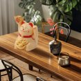 thumbnail image 5 of Riousery 2-Inch Solar Powered Waving Arm Lucky Cat Ornament, Welcoming Wealth Fortune Cat Decorative Figurine for Office Desk, Car Dashboard, and Home Decor - Yellow Variant, 5 of 9