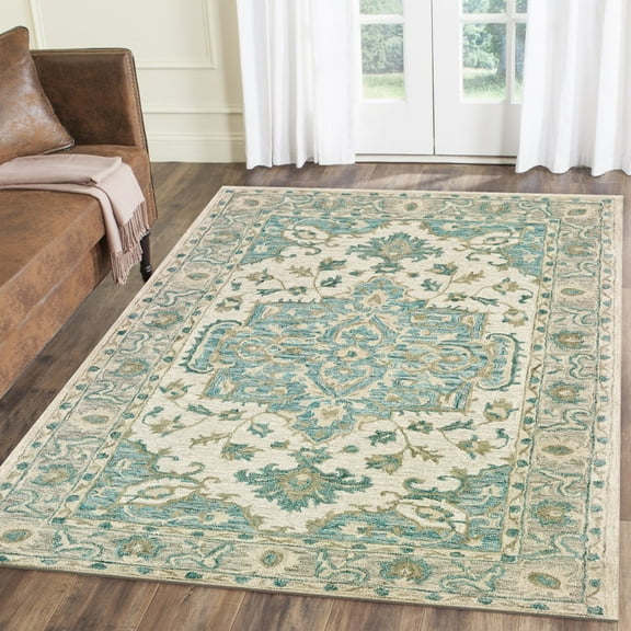 5â€™ x 8â€™ Turquoise and Cream Medallion Area Rug