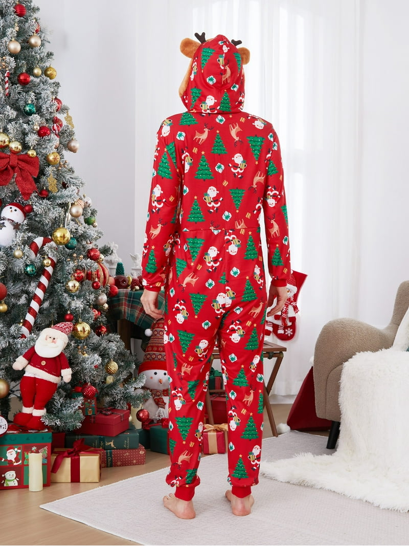 De Moeder En De Dochter Kleedden Zich Als Kerstman Met Gift, Sneeuw