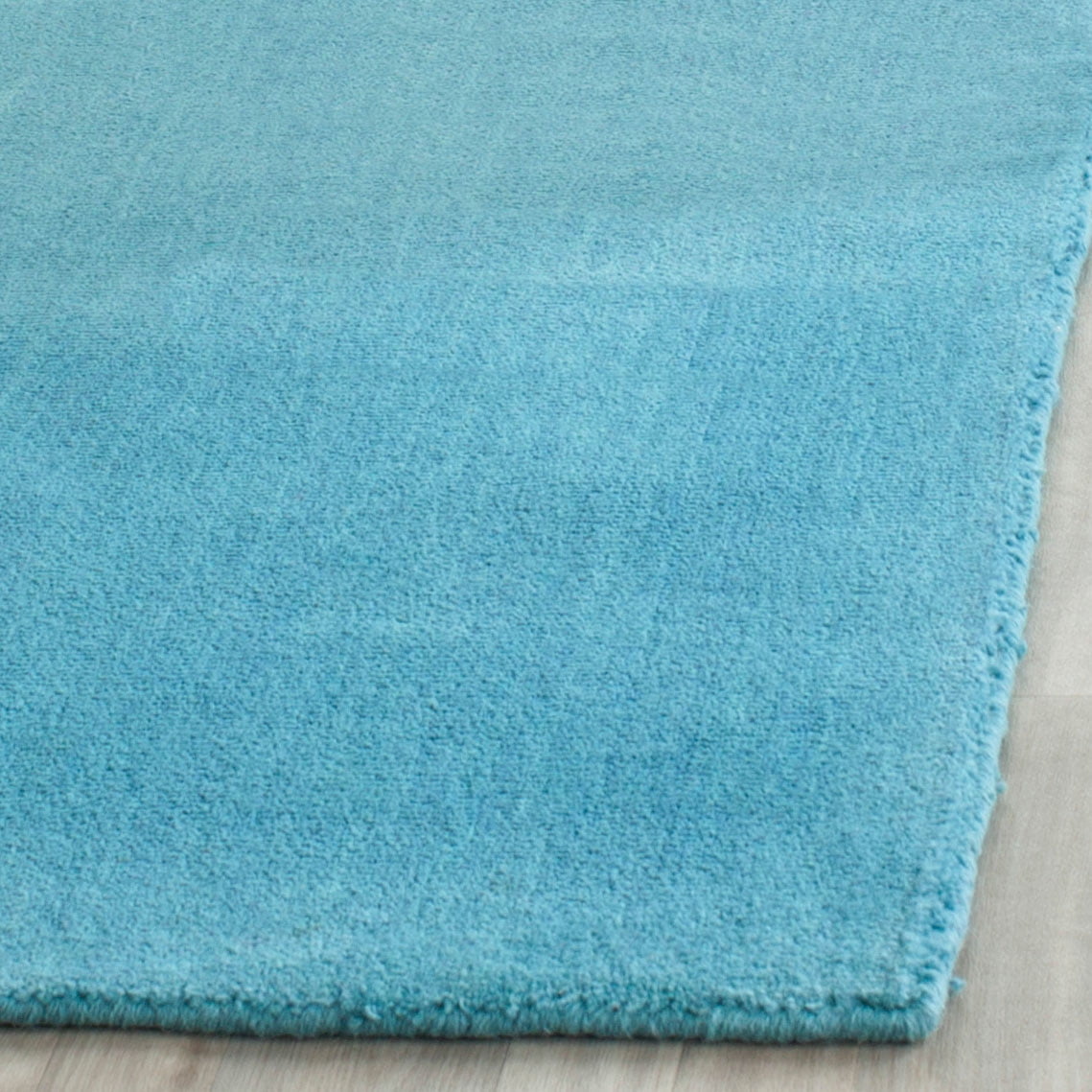 SAFAVIEH Himalaya Rachelle Solid Wool Runner Rug, Turquoise, 2'3" x 10'
