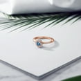 thumbnail image 4 of Gem Stone King 18K Rose Gold Plated Silver Persian Blue Moissanite Engagement Ring for Women (0.69 Cttw, Gemstone Birthstone, Round 5MM, Size 7), 4 of 4