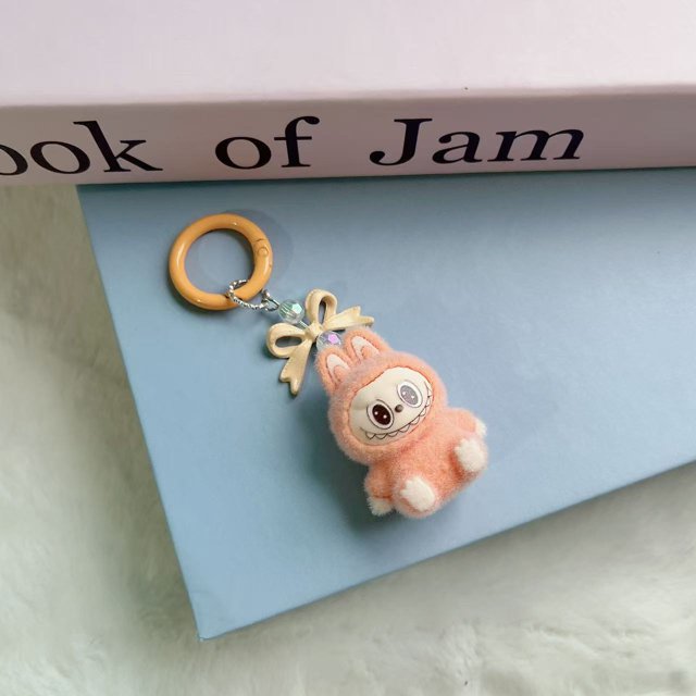 Nuevo Labubu llavero colgante Kawaii dibujos animados lindo teléfono cadena Linda muñeca mochila colgante regalos